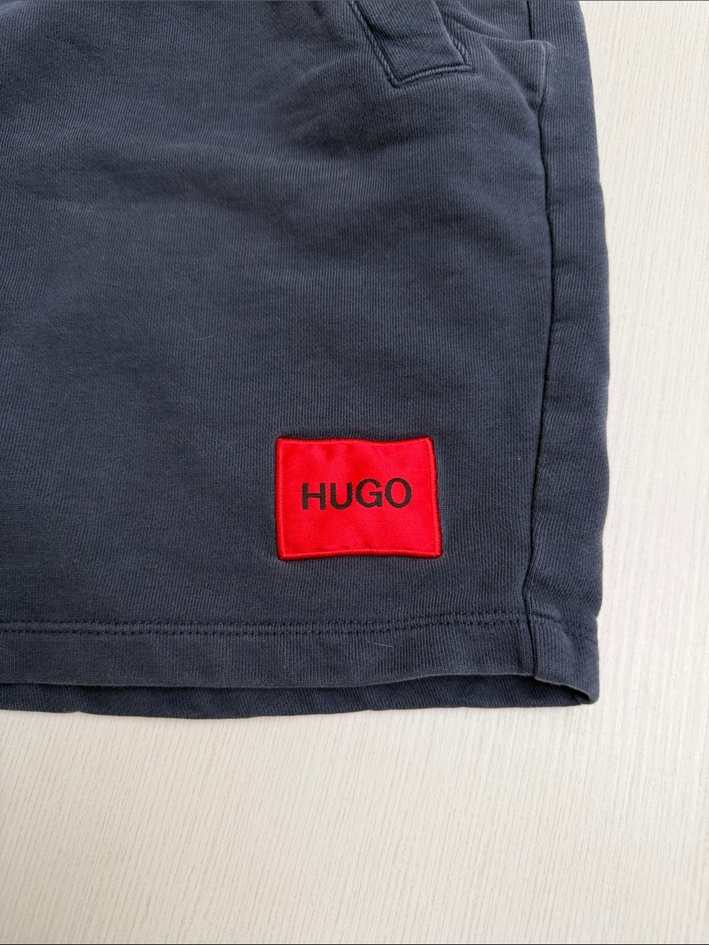 HUGO Men's Dark Navy Athletic Shorts with Red Logo Patch - Picture 2 of 4